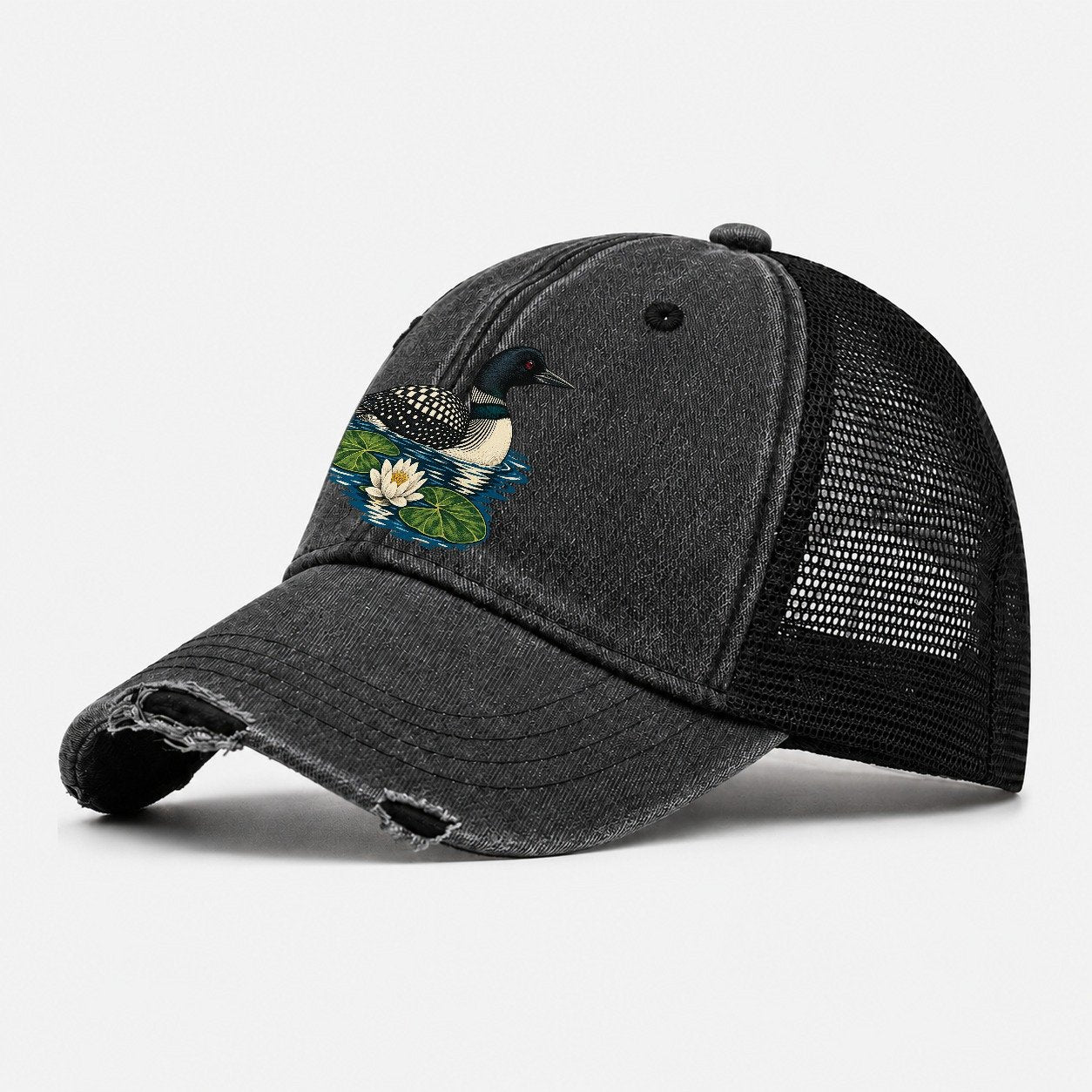Common Loon And Water Lilies Canada Cultural Icons Washed Trucker Hat – Black