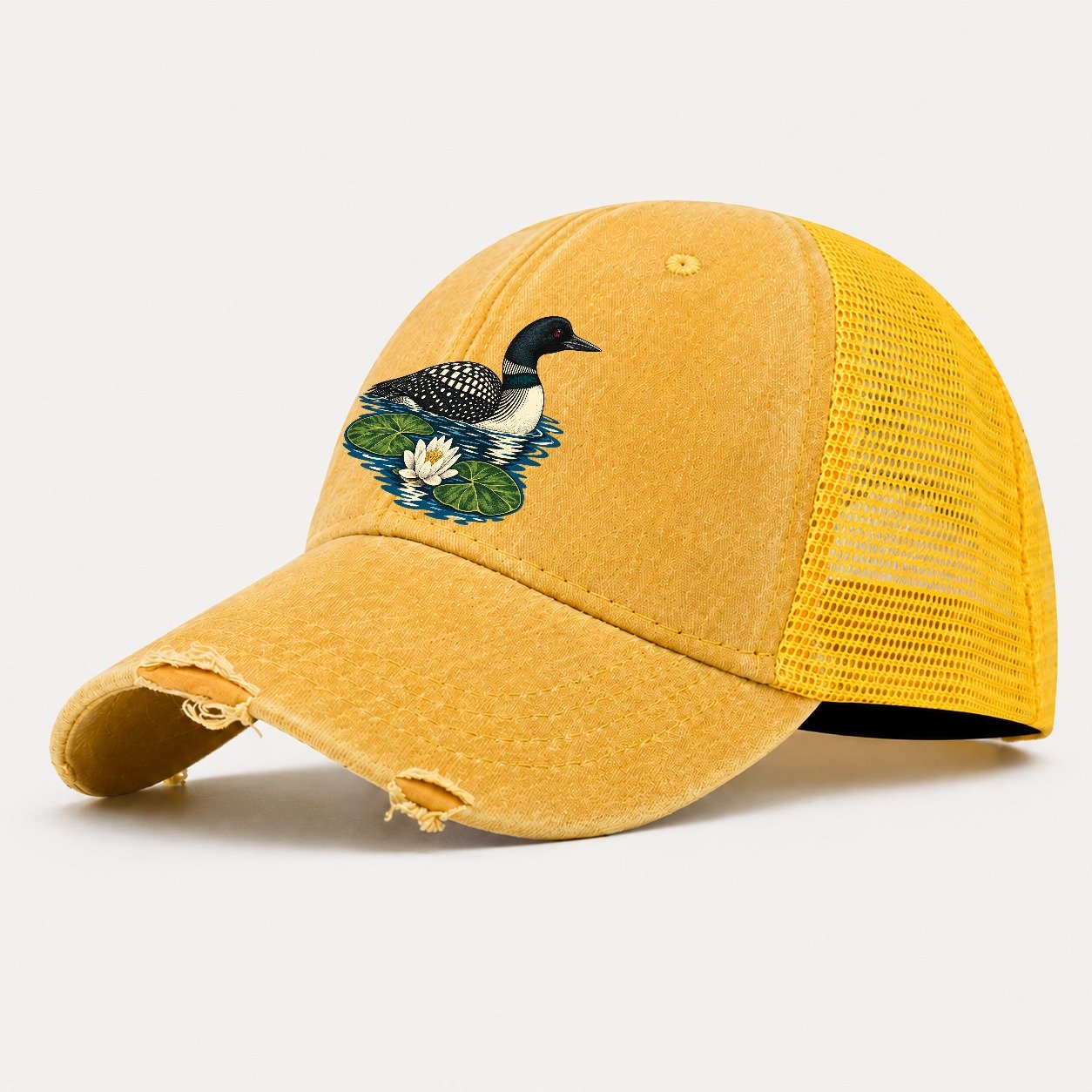 Common Loon And Water Lilies Canada Cultural Icons Washed Trucker Hat – Yellow