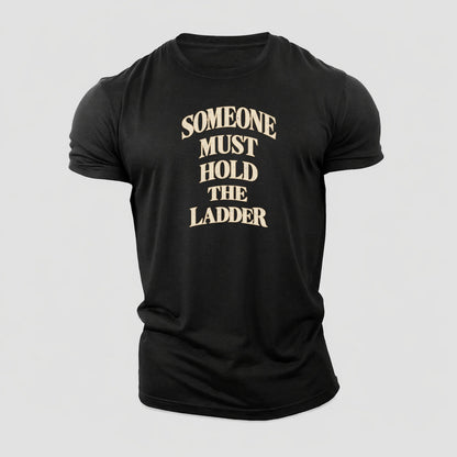 Someone Must Hold The Ladder Quiet Statements Cotton T-Shirt – Black