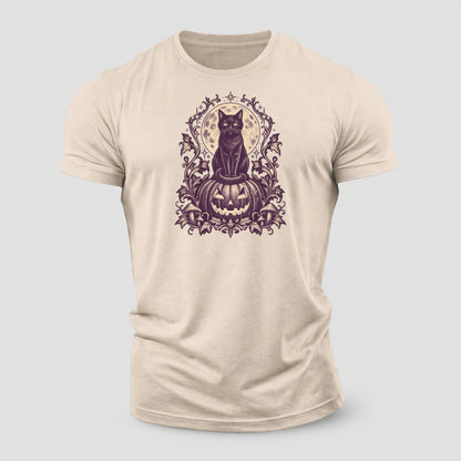 A Black Cat Sitting Upright On Top Of A Large Carved Jack O Lantern Tail Curled Around Its Paws A Full Moon Glowing Behind It Wordless Single Hue Gothic Engraving Portrait Midnight Haunt Cotton T-Shirt – Sand