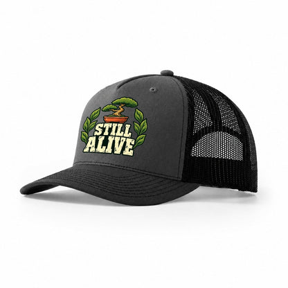 Still Alive Bonsai Trucker Hat – Dark Grey Black