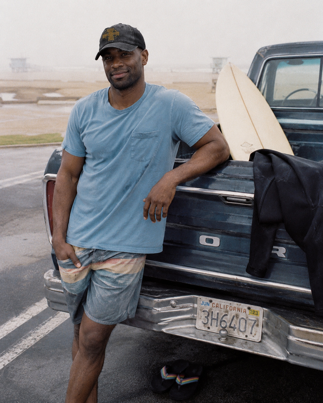 Celtic Cross washed trucker hat – worn, lifestyle photo