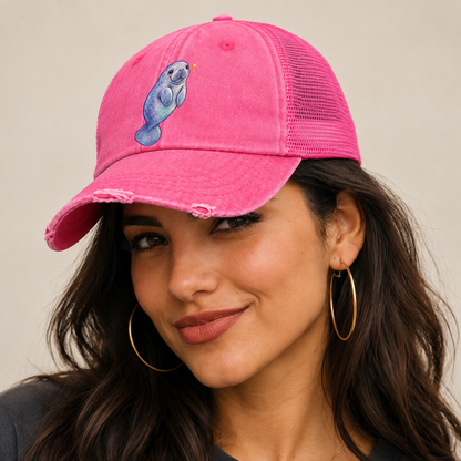 Manatee Upward Float Sea Sprite Washed Trucker Hat — studio model wearing the hat