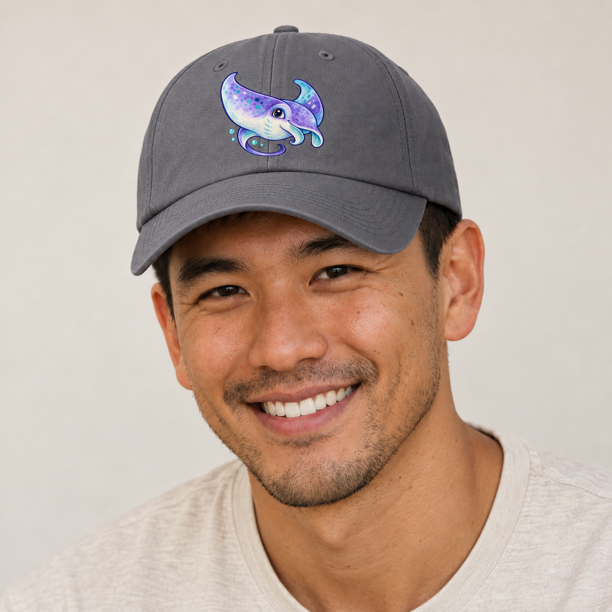 Manta Ray Barrel Turn Sea Sprite Baseball Cap — studio model wearing the hat