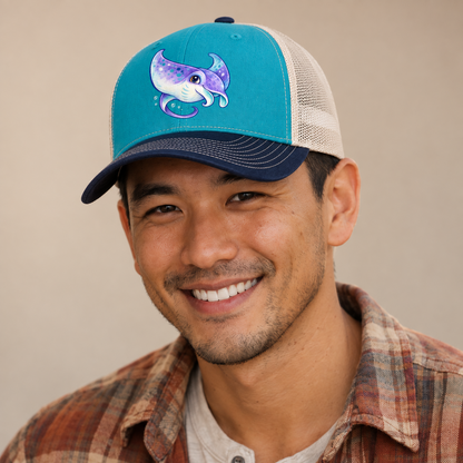Manta Ray Barrel Turn Sea Sprite Trucker Hat — studio model wearing the hat