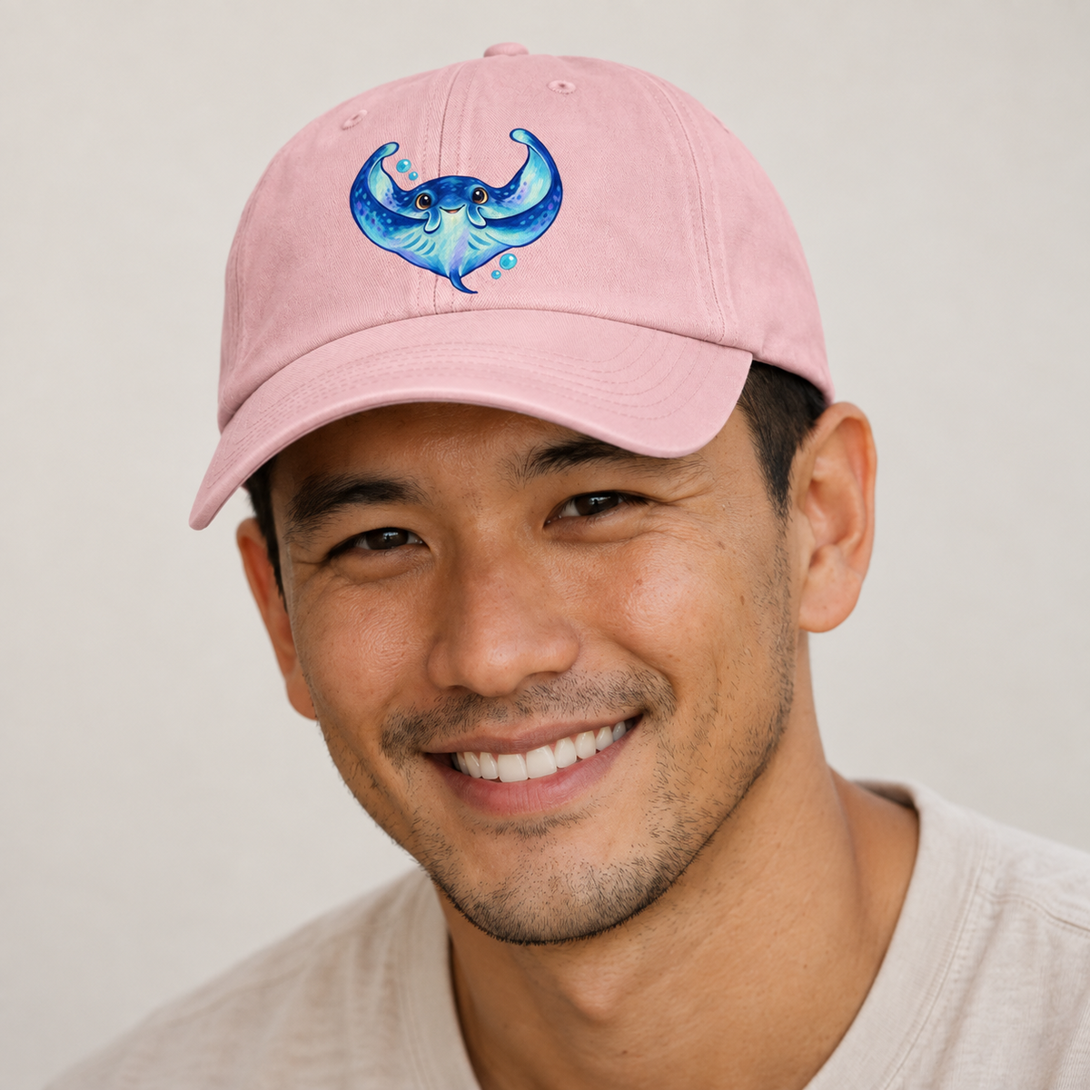 Manta Ray Wing Hug Sea Sprite Baseball Cap — studio model wearing the hat
