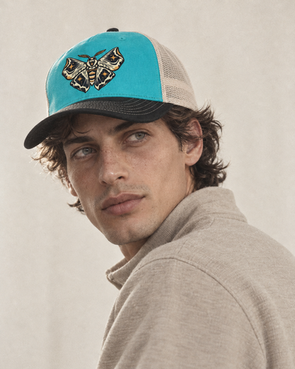 Model wearing the cap