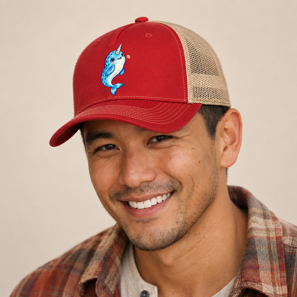 Narwhal Upward Swim Sea Sprite Trucker Hat — studio model wearing the hat
