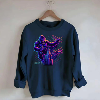 giant gorilla on top of skyscraper holding small figure, swatting planes - Crewneck Sweatshirt - navy