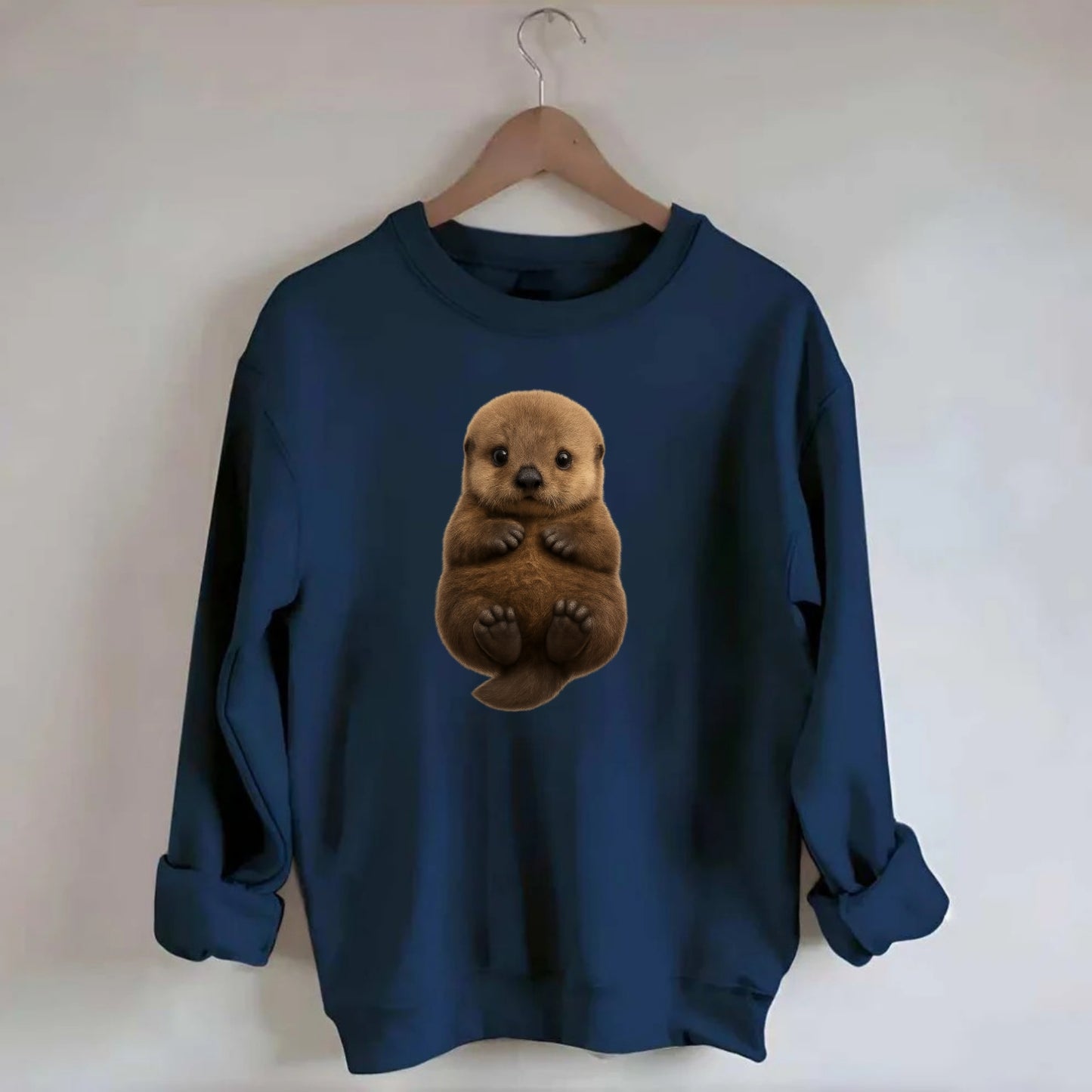 Baby Sea Otter - brown fluffy, floating on back, tiny paws, bright eyes, - Crewneck Sweatshirt - navy