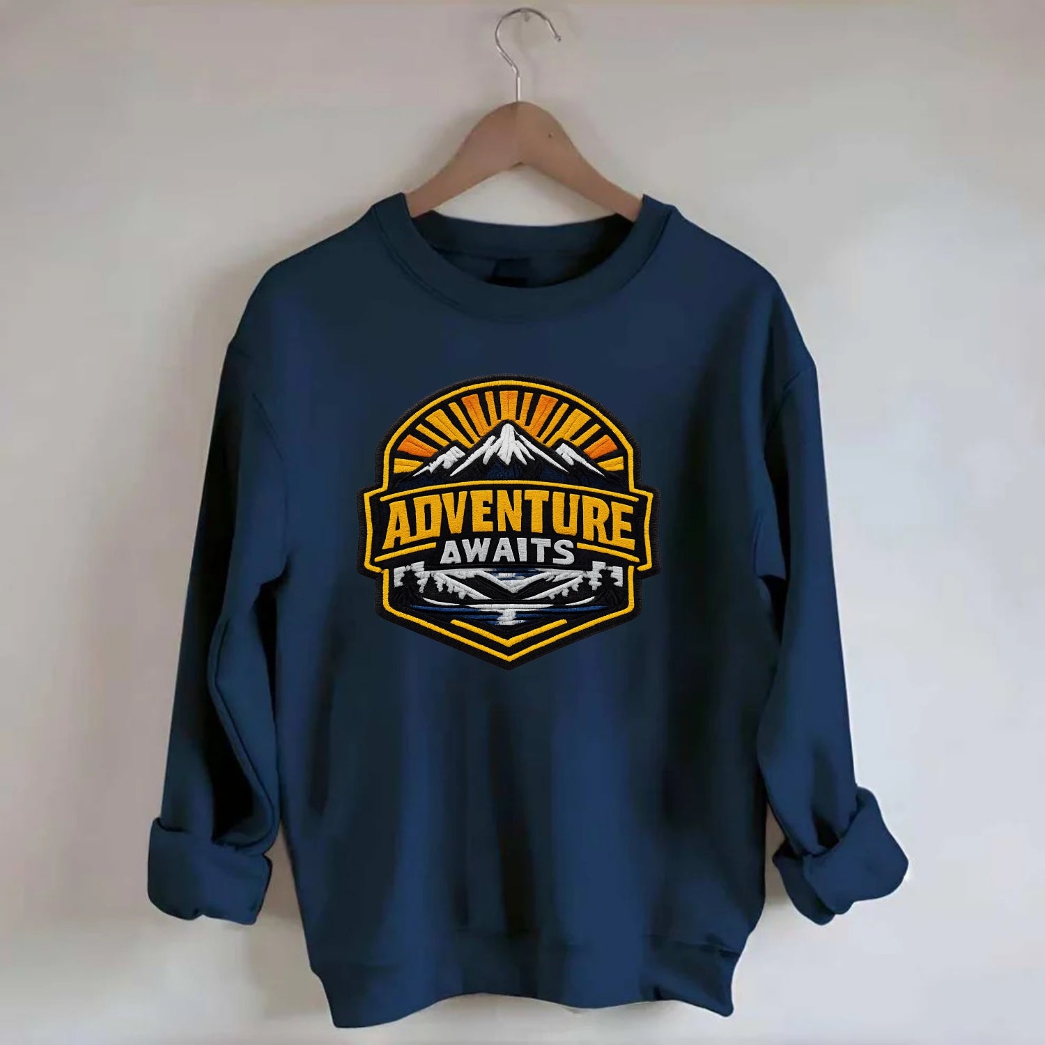 ADVENTURE AWAITS - mountain sunrise with text in gold and blue , wanderlust - Crewneck Sweatshirt - navy
