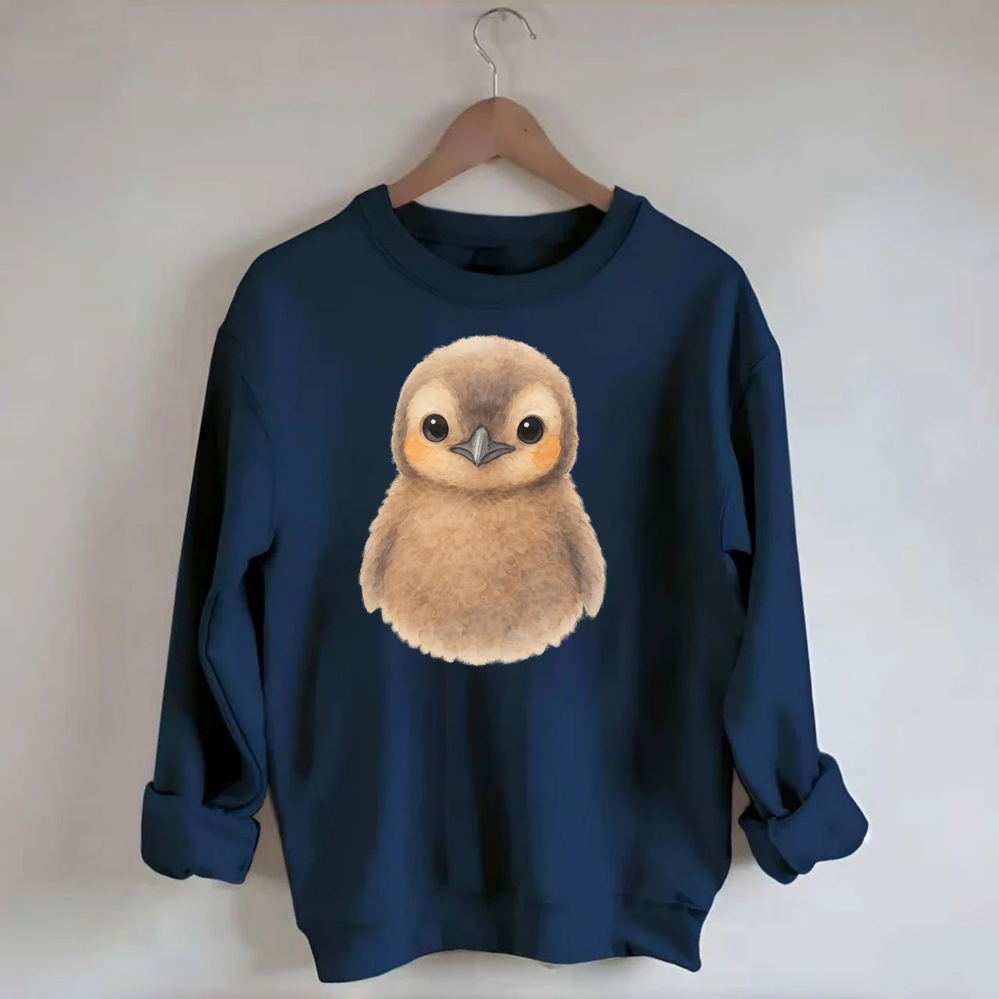 Baby King Penguin - orange cheek patches, fluffy brown, large eyes, - Crewneck Sweatshirt - navy