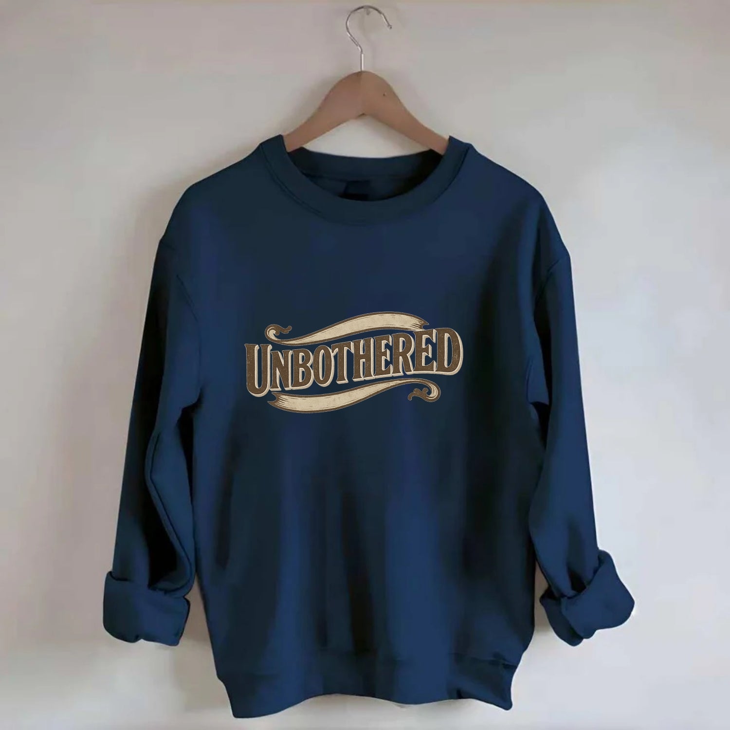 Bold typography design - "UNBOTHERED" - not affected, staying calm - Crewneck Sweatshirt - navy