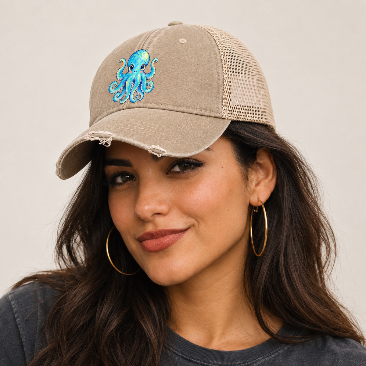 Octopus Curious Wave Sea Sprite Washed Trucker Hat — studio model wearing the hat
