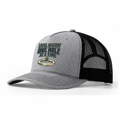 One Hole At A Time Treasure Hunting Trucker Hat – Sport Grey Black