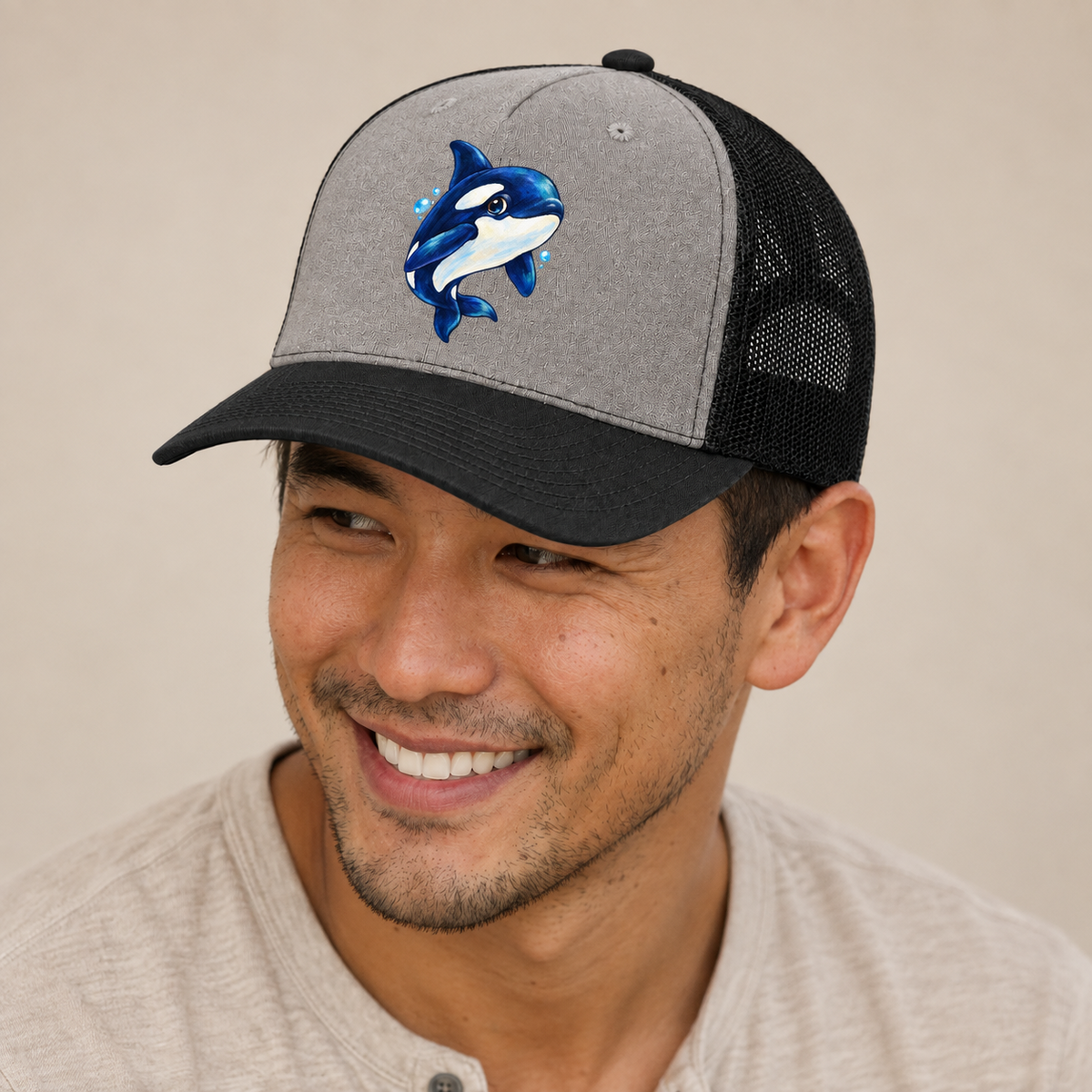 Orca Three Quarter Glide Sea Sprite Trucker Hat — studio model wearing the hat