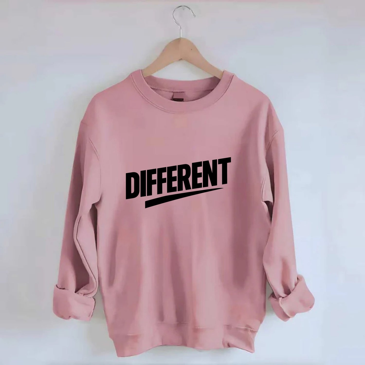 Bold typography design - "DIFFERENT" - standing out, not following crowd - Crewneck Sweatshirt - pink