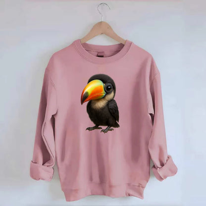 Baby Toucan - oversized colorful beak, black feathers, bright eyes, - Crewneck Sweatshirt - pink