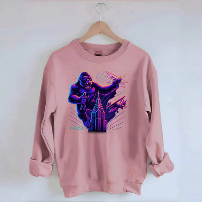 giant gorilla on top of skyscraper holding small figure, swatting planes - Crewneck Sweatshirt - pink