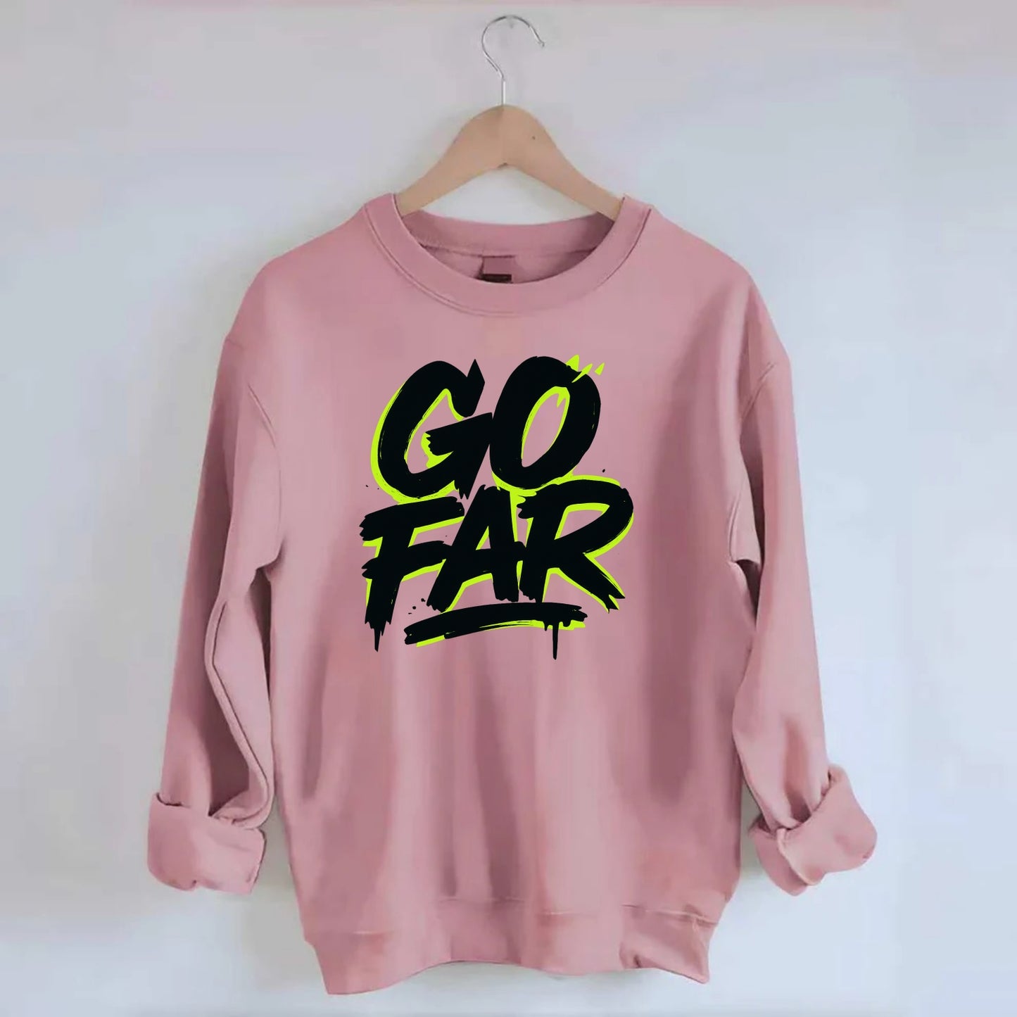 Bold typography design - "GO FAR" - distance goals, pushing limits - Crewneck Sweatshirt - pink