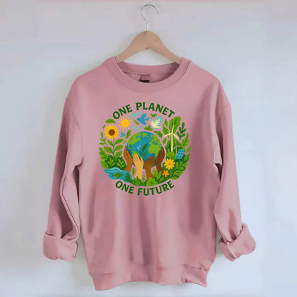 Globe surrounded by hands of all colors working together - "One Planet, One - Crewneck Sweatshirt - pink