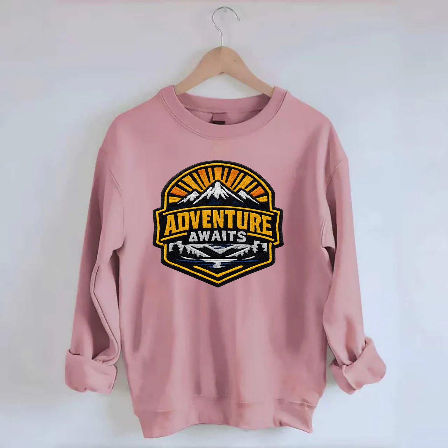 ADVENTURE AWAITS - mountain sunrise with text in gold and blue , wanderlust - Crewneck Sweatshirt - pink