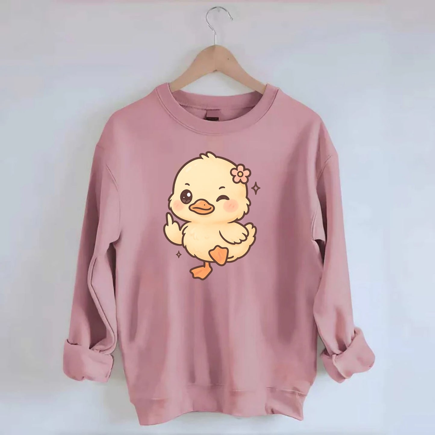 fluffy baby duck with small flower, one webbed foot raised sassily - Crewneck Sweatshirt - pink
