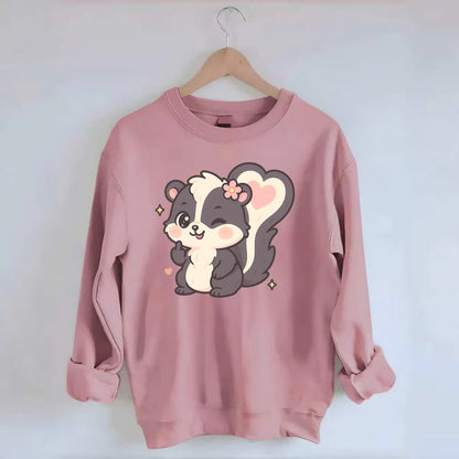 fluffy skunk with heart-shaped tail pattern, one paw up showing sass - Crewneck Sweatshirt - pink