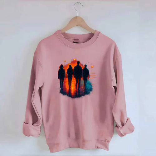 gang of silhouettes walking together at sunset by the beach - Crewneck Sweatshirt