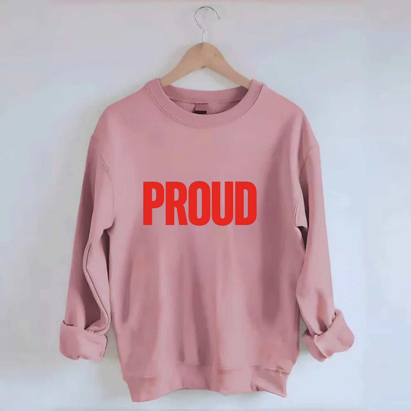 Bold typography design - "PROUD" - satisfied, honored, dignified - Crewneck Sweatshirt - pink