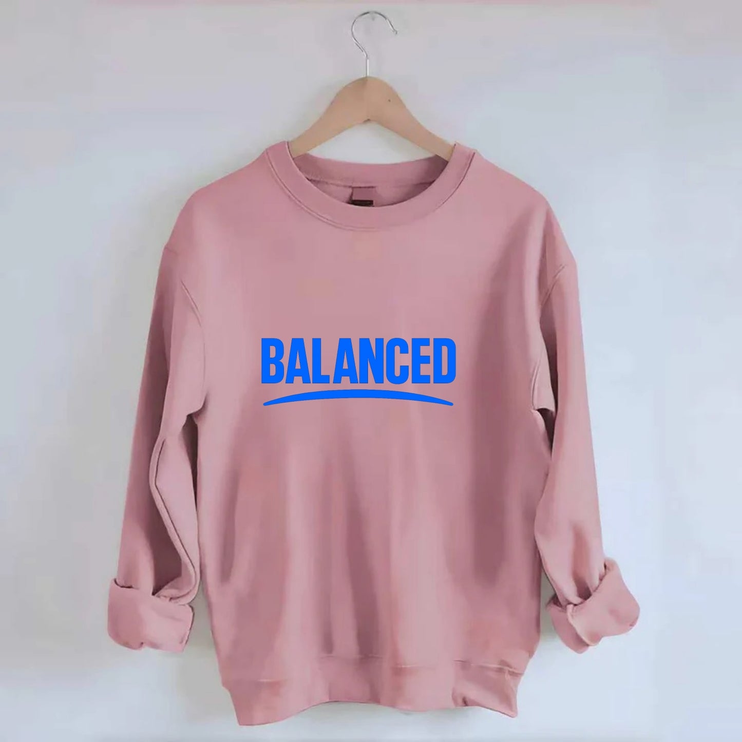 Bold typography design - "BALANCED" - harmony, equilibrium, centered life - Crewneck Sweatshirt - pink