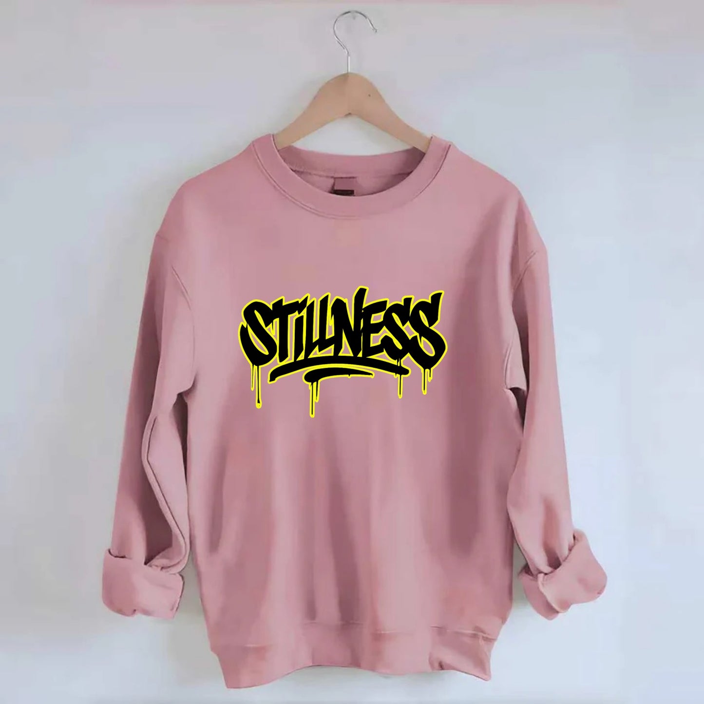 Bold typography design - "STILLNESS" - quiet power, peaceful presence - Crewneck Sweatshirt - pink