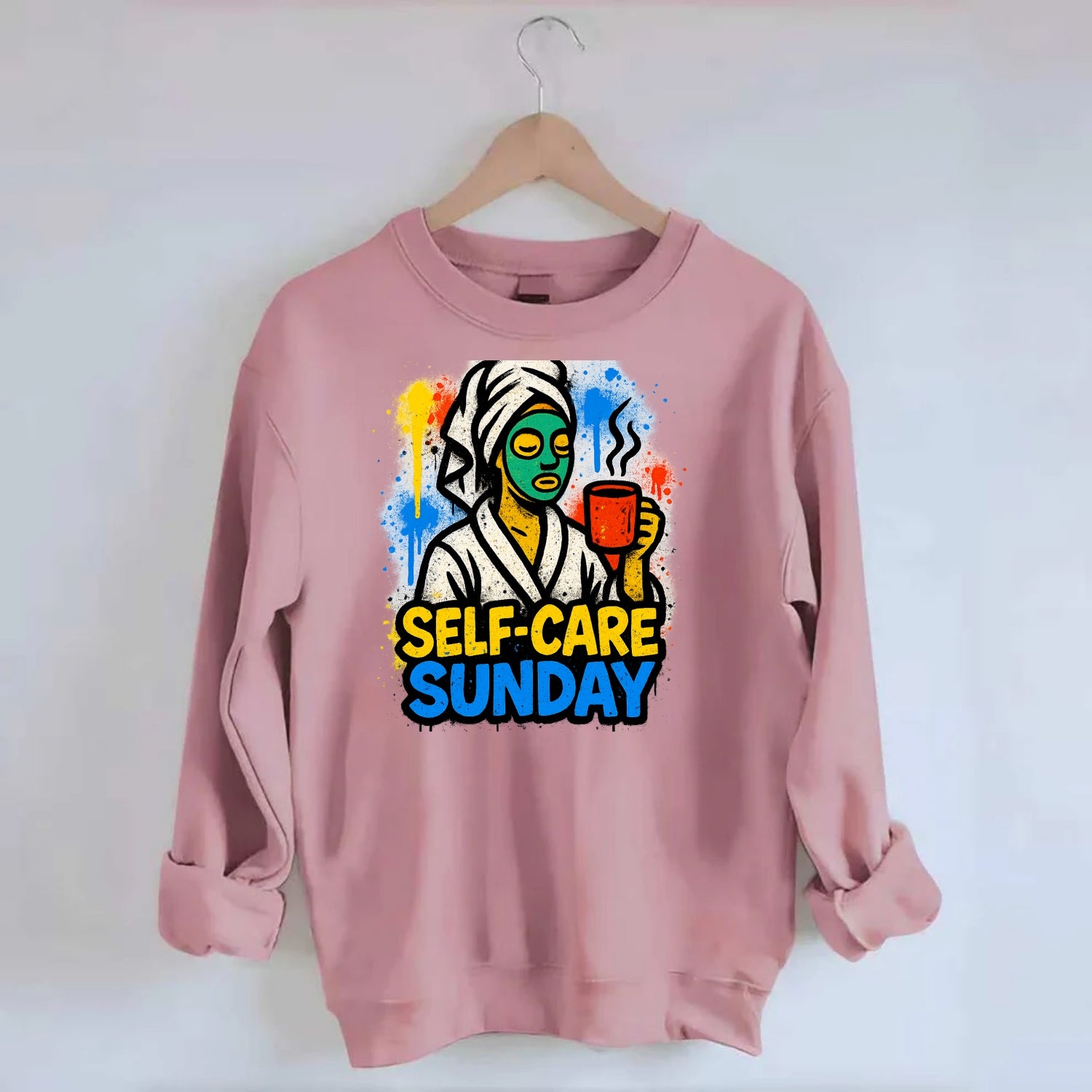Person in bathrobe with face mask and tea - self-care Sunday ritual, wellness - Crewneck Sweatshirt - pink