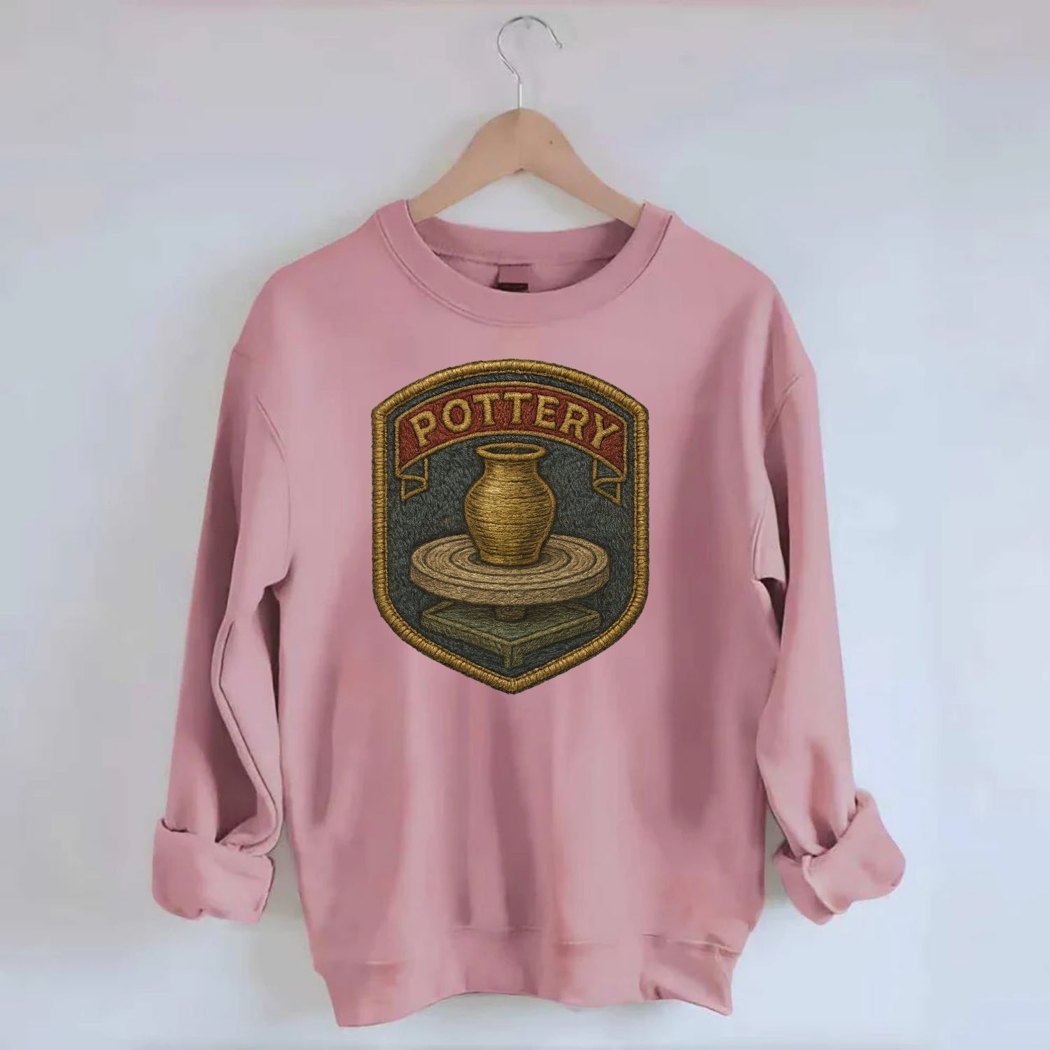 Pottery wheel with clay vessel - ceramicist symbol - Crewneck Sweatshirt - pink
