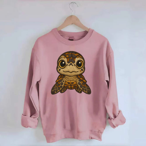 Baby Hawksbill Turtle - amber and brown shell pattern, curious golden eyes, - Crewneck Sweatshirt