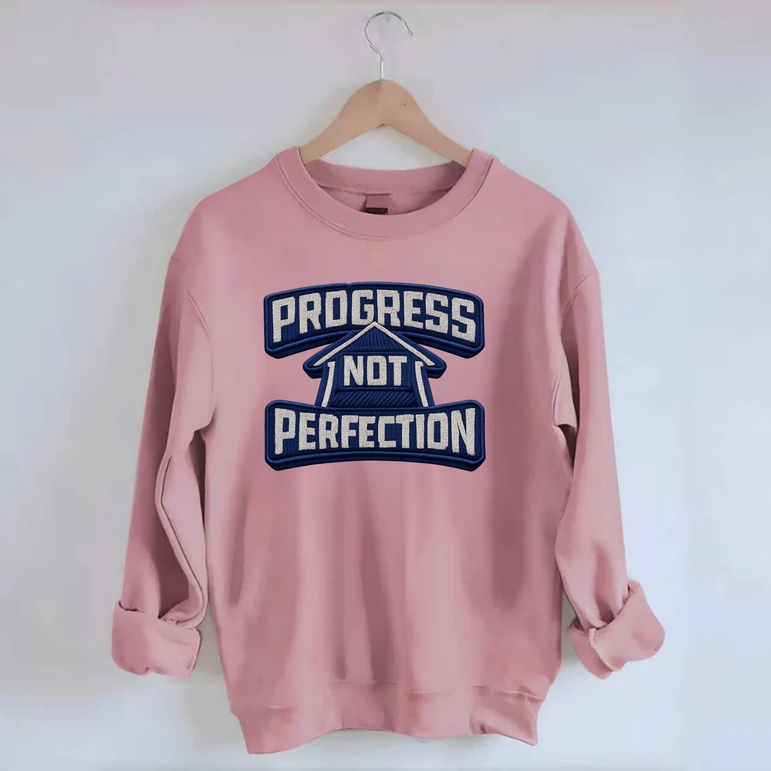PROGRESS NOT PERFECTION - arrow with text in blue , growth mindset - Crewneck Sweatshirt - pink