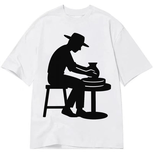 Potter shaping clay on wheel - Classic T-shirt