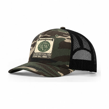 Cedar Ball House Izakaya Rules Trucker Hat – Woodland Camo Black