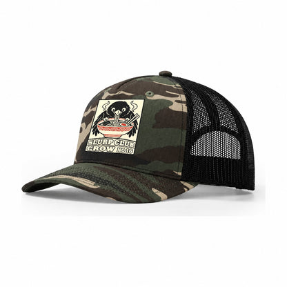 Crow Leftovers Slurp Club Trucker Hat – Woodland Camo Black