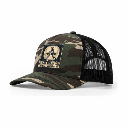 Last Train Bar Izakaya Rules Trucker Hat – Woodland Camo Black
