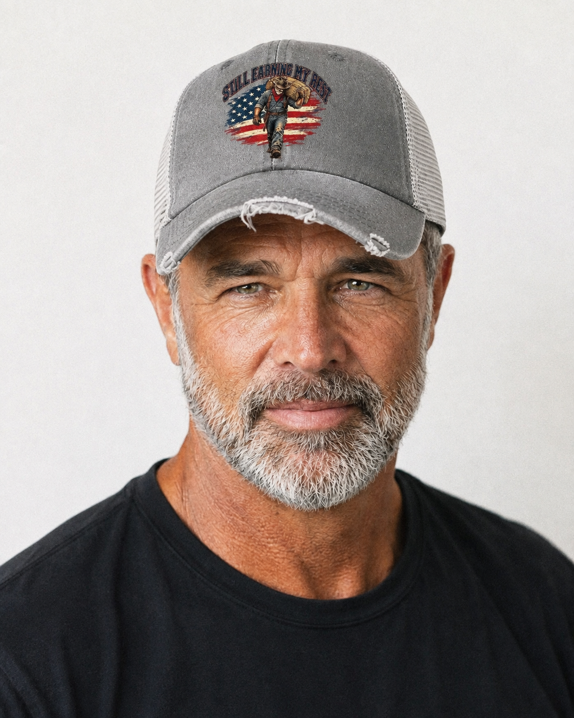 Still Earning My Rest Old Man Strong Washed Trucker Hat – studio model photo