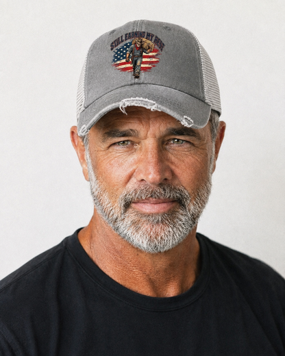 Still Earning My Rest Old Man Strong Washed Trucker Hat – studio model photo