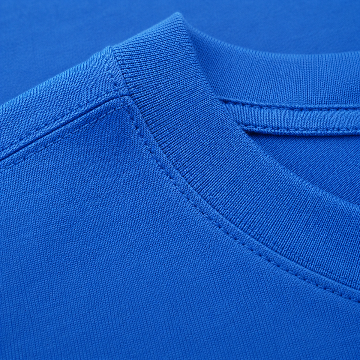 The Classic Hat For Explorers And Travelers Classic T-shirt – blue fabric close-up