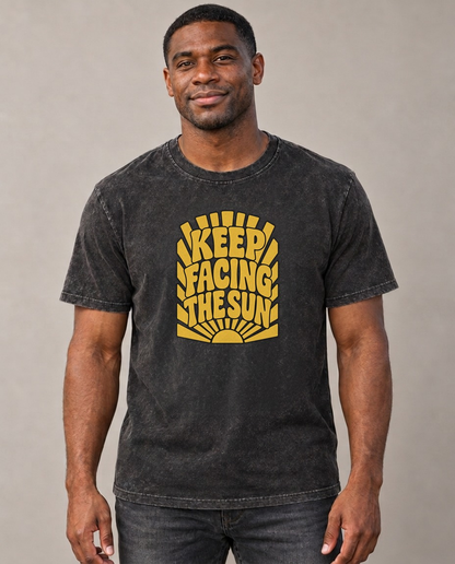 Keep Facing The Sun Sunburst Sayings Vintage T-shirt – black, small print on model (AI mockup)