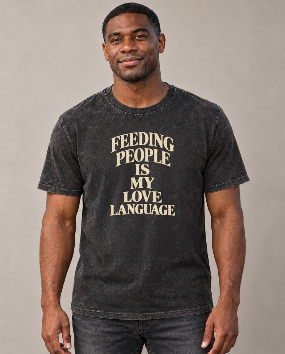 Feeding People Is My Love Language Quiet Statements Vintage T-shirt – black, small print on model (AI mockup)