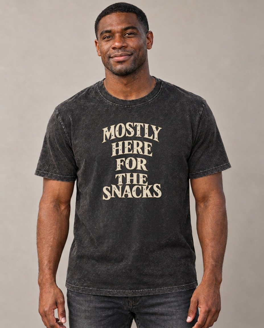 Mostly Here For The Snacks Quiet Statements Vintage T-shirt – black, small print on model (AI mockup)