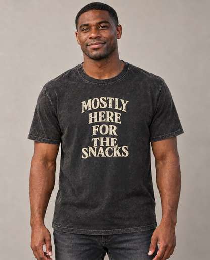 Mostly Here For The Snacks Quiet Statements Vintage T-shirt – black, small print on model (AI mockup)