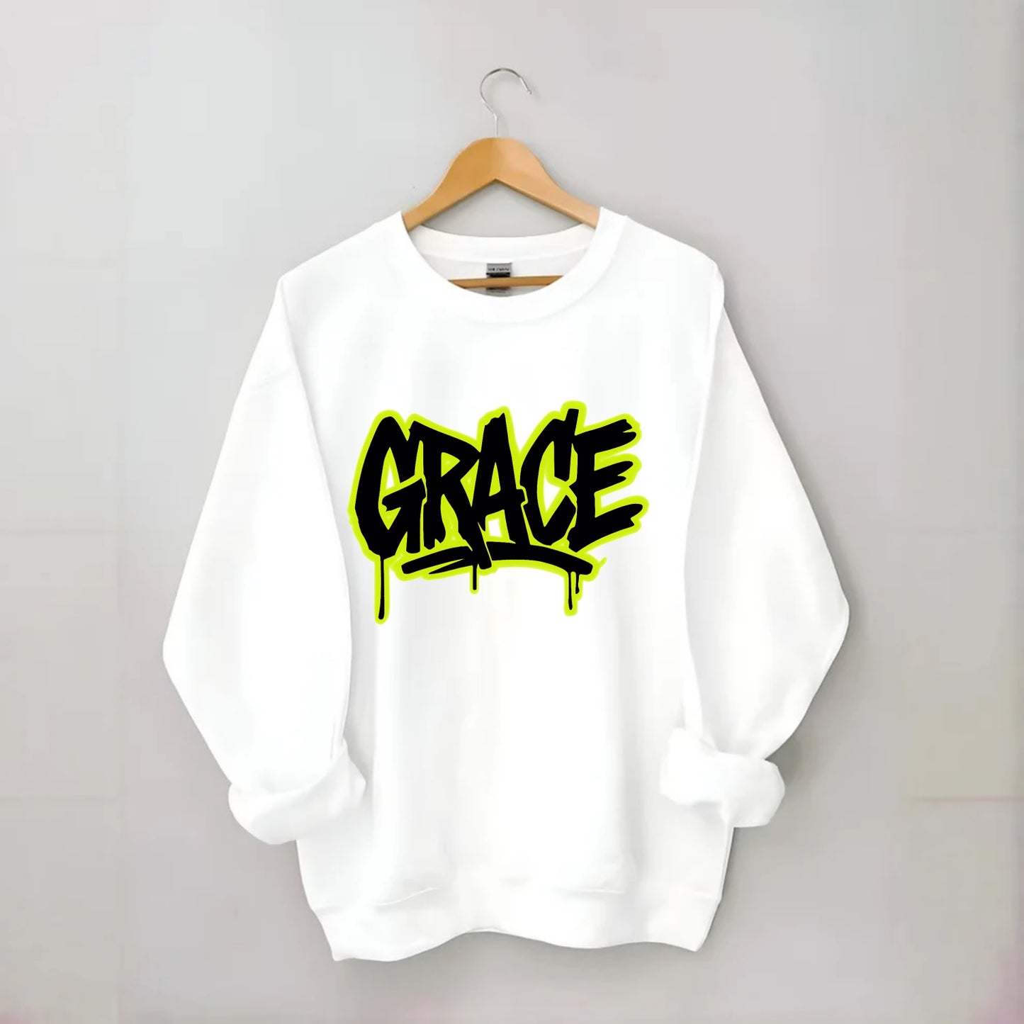 Bold typography design - "GRACE" - elegance under pressure, divine favor - Crewneck Sweatshirt - white