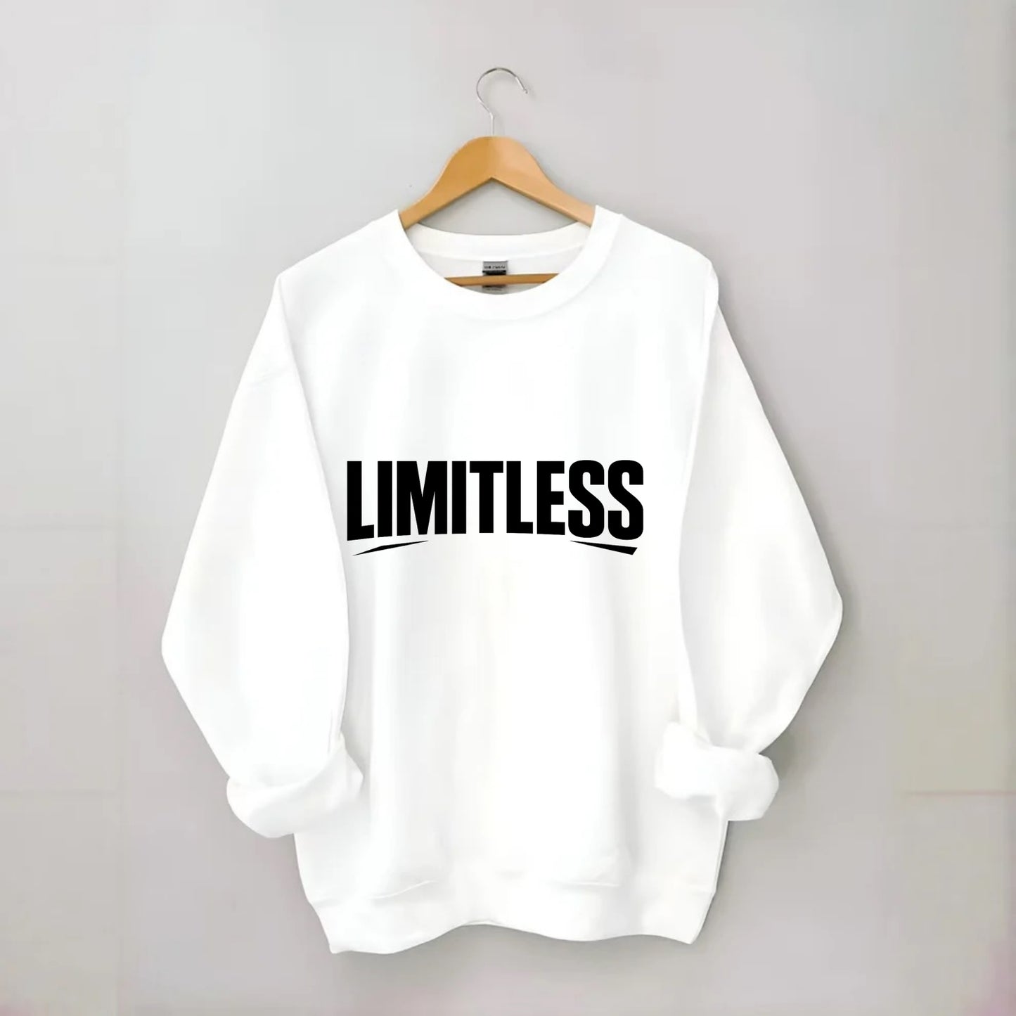 Bold typography design - "LIMITLESS" - no boundaries, infinite potential - Crewneck Sweatshirt - white
