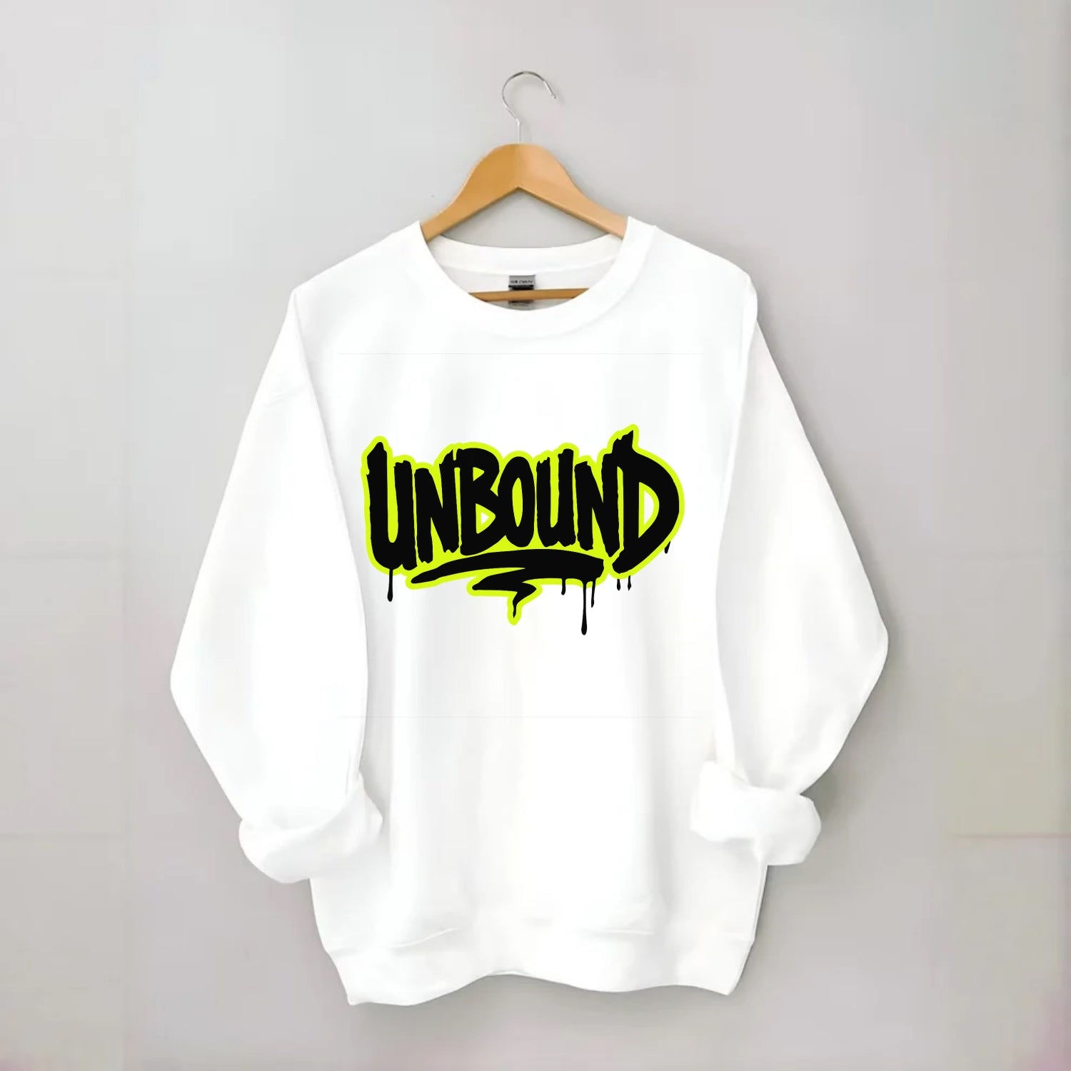 Bold typography design - "UNBOUND" - without limits, free from constraints - Crewneck Sweatshirt - white